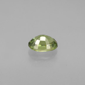0.56캐럿 천연 골든 그린 데만토이드 가넷, 타원형 컷, 5.7×3.9 mm, VVS-VS