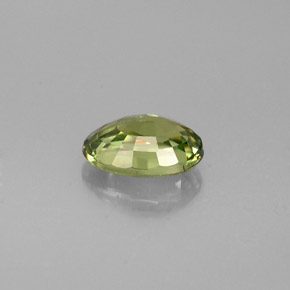 0.53캐럿 천연 골든 그린 데만토이드 가넷, 타원형 컷, 5.8×4 mm, VS