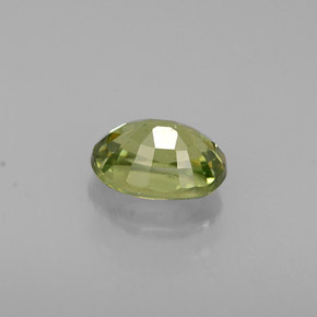 0.68캐럿 천연 골든 그린 데만토이드 가넷, 타원형 컷, 5.8×4.2 mm, VS