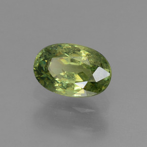 0.66캐럿 천연 골든 그린 데만토이드 가넷, 타원형 컷, 6.1×4 mm, VS