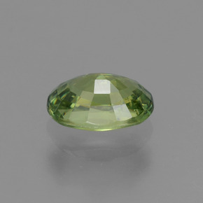 0.66캐럿 천연 골든 그린 데만토이드 가넷, 타원형 컷, 6.1×4 mm, VS
