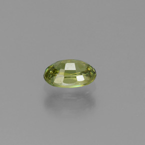 0.59캐럿 천연 골든 그린 데만토이드 가넷, 타원형 컷, 6×3.9 mm, VVS-VS