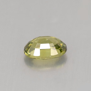 0.65캐럿 천연 골든 그린 데만토이드 가넷, 타원형 컷, 6.1×4.1 mm, VVS-VS