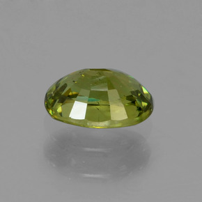 0.67캐럿 천연 골든 그린 데만토이드 가넷, 타원형 컷, 6×4.3 mm, VS-SI