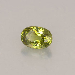 0.63캐럿 천연 골든 그린 데만토이드 가넷, 타원형 컷, 5.9×4.1 mm, VS