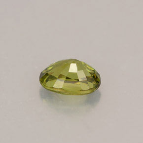 0.63캐럿 천연 골든 그린 데만토이드 가넷, 타원형 컷, 5.9×4.1 mm, VS