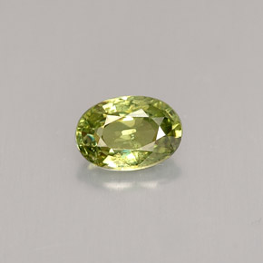 0.59캐럿 천연 골든 그린 데만토이드 가넷, 타원형 컷, 6×4.2 mm, VS