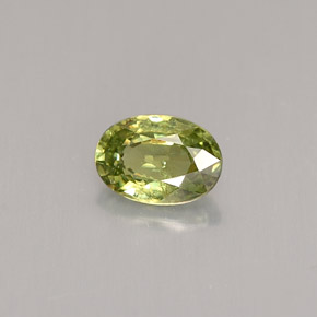 0.59캐럿 천연 골든 그린 데만토이드 가넷, 타원형 컷, 6×4.2 mm, VS