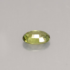 0.59캐럿 천연 골든 그린 데만토이드 가넷, 타원형 컷, 6×4.2 mm, VS