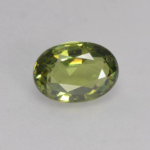 0.64캐럿 천연 흙빛 녹색 데만토이드 가넷, 타원형 컷, 5.8×4.1 mm, VS