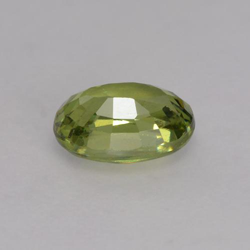 0.64캐럿 천연 흙빛 녹색 데만토이드 가넷, 타원형 컷, 5.8×4.1 mm, VS