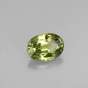 0.62캐럿 천연 골든 그린 데만토이드 가넷, 타원형 컷, 5.9×4.3 mm, VS