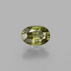 0.65캐럿 천연 골든 그린 데만토이드 가넷, 타원형 컷, 6.1×4.3 mm, VS