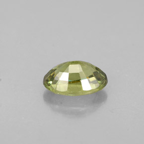 0.63캐럿 천연 골든 그린 데만토이드 가넷, 타원형 컷, 6×4.1 mm, VVS-VS