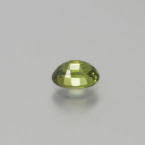 0.71캐럿 천연 골든 그린 데만토이드 가넷, 타원형 컷, 6.1×4.3 mm, VVS-VS
