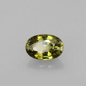 0.65캐럿 천연 녹빛 골든 데만토이드 가넷, 타원형 컷, 6.2×4.2 mm, VS-SI