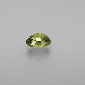 0.72캐럿 천연 골든 그린 데만토이드 가넷, 타원형 컷, 6.1×4.3 mm, VVS-VS