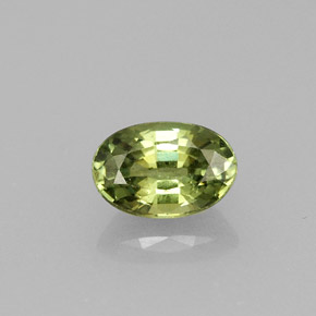 0.71캐럿 천연 골든 그린 데만토이드 가넷, 타원형 컷, 6.2×4.2 mm, VVS-VS