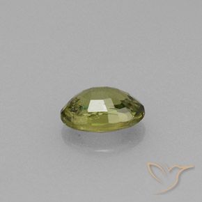 0.61캐럿 천연 라이트 그린 데만토이드 가넷, 타원형 컷, 5.8×4.1 mm, VVS-VS