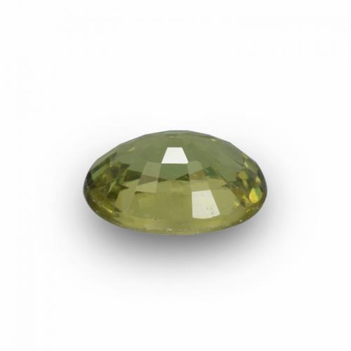 0.65캐럿 천연 골든 그린 데만토이드 가넷, 타원형 컷, 6.1×4.3 mm, VVS-VS