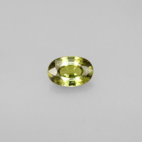 0.59캐럿 천연 골든 그린 데만토이드 가넷, 타원형 컷, 6.2×4.2 mm, VVS-VS