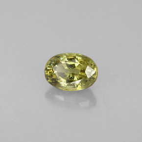 0.71캐럿 천연 골든 그린 데만토이드 가넷, 타원형 컷, 5.9×4.2 mm, VS
