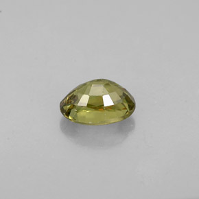 0.71캐럿 천연 골든 그린 데만토이드 가넷, 타원형 컷, 5.9×4.2 mm, VS