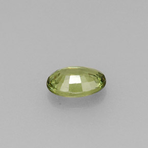 0.53캐럿 천연 골든 그린 데만토이드 가넷, 타원형 컷, 5.8×4.1 mm, VVS-VS