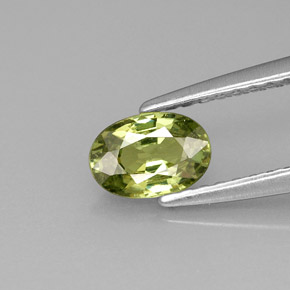 0.59캐럿 천연 골든 그린 데만토이드 가넷, 타원형 컷, 6.1×4.2 mm, VVS-VS
