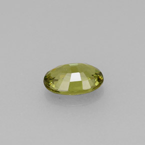 0.57캐럿 천연 골든 그린 데만토이드 가넷, 타원형 컷, 6×4.1 mm, VVS-VS