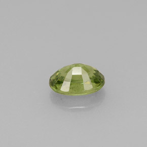 0.67캐럿 천연 골든 그린 데만토이드 가넷, 타원형 컷, 5.9×4.2 mm, VS