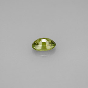 0.65캐럿 천연 골든 그린 데만토이드 가넷, 타원형 컷, 6.1×4.1 mm, VS