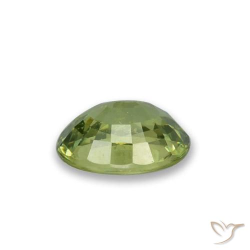0.65캐럿 천연 노란빛 그린 데만토이드 가넷, 타원형 컷, 6×4.3 mm, VS