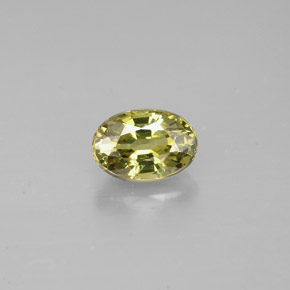 0.71캐럿 천연 골든 그린 데만토이드 가넷, 타원형 컷, 6.1×4.2 mm, VS