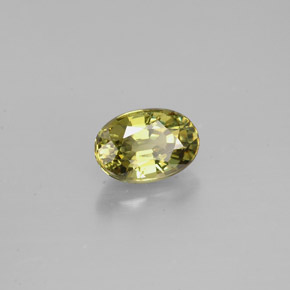 0.71캐럿 천연 골든 그린 데만토이드 가넷, 타원형 컷, 6.1×4.2 mm, VS