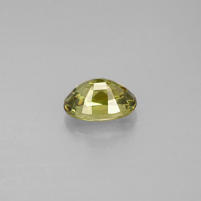 0.71캐럿 천연 골든 그린 데만토이드 가넷, 타원형 컷, 6.1×4.2 mm, VS