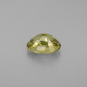 0.68캐럿 천연 골든 그린 데만토이드 가넷, 타원형 컷, 6×4.1 mm, VS