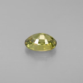 0.66캐럿 천연 골든 그린 데만토이드 가넷, 타원형 컷, 6×4.2 mm, VS