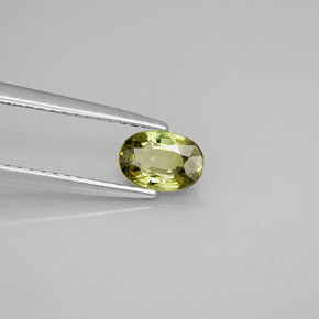 0.63캐럿 천연 골든 그린 데만토이드 가넷, 타원형 컷, 6.2×4.3 mm, VS