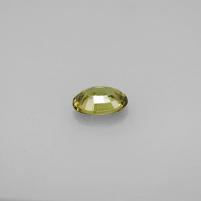 0.63캐럿 천연 골든 그린 데만토이드 가넷, 타원형 컷, 6.2×4.3 mm, VS