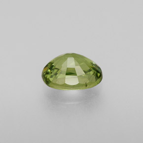 0.72캐럿 천연 골든 그린 데만토이드 가넷, 타원형 컷, 5.9×4.3 mm, VS