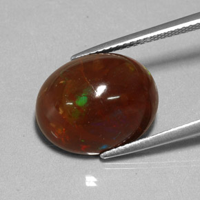 6.48캐럿 천연 멀티컬러 파이어 오팔, 타원형 컷, 14.7×12.1 mm, 불투명체
