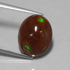 6.48캐럿 천연 멀티컬러 파이어 오팔, 타원형 컷, 14.7×12.1 mm, 불투명체