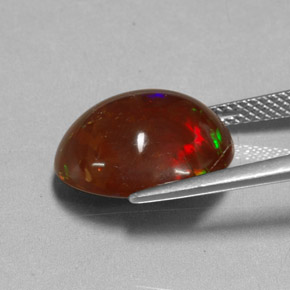 6.48캐럿 천연 멀티컬러 파이어 오팔, 타원형 컷, 14.7×12.1 mm, 불투명체