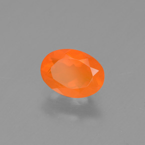 0.48캐럿 천연 오렌지 파이어 오팔, 타원형 컷, 7×5.1 mm, 투명한