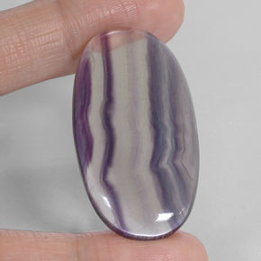 60.84캐럿 천연 멀티컬러 플루오라이트, 타원형 컷, 41.2×20.5 mm, 투명한