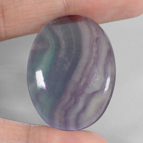52.83캐럿 천연 멀티컬러 플루오라이트, 타원형 컷, 31.8×23.7 mm, 투명한