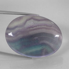 52.83캐럿 천연 멀티컬러 플루오라이트, 타원형 컷, 31.8×23.7 mm, 투명한