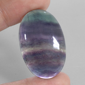 50.17캐럿 천연 멀티컬러 플루오라이트, 타원형 컷, 32.7×21.3 mm, 투명한