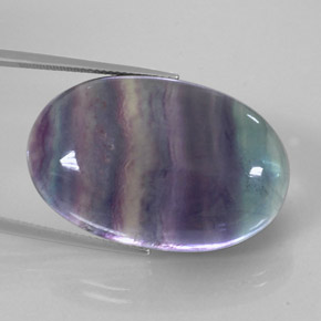50.17캐럿 천연 멀티컬러 플루오라이트, 타원형 컷, 32.7×21.3 mm, 투명한